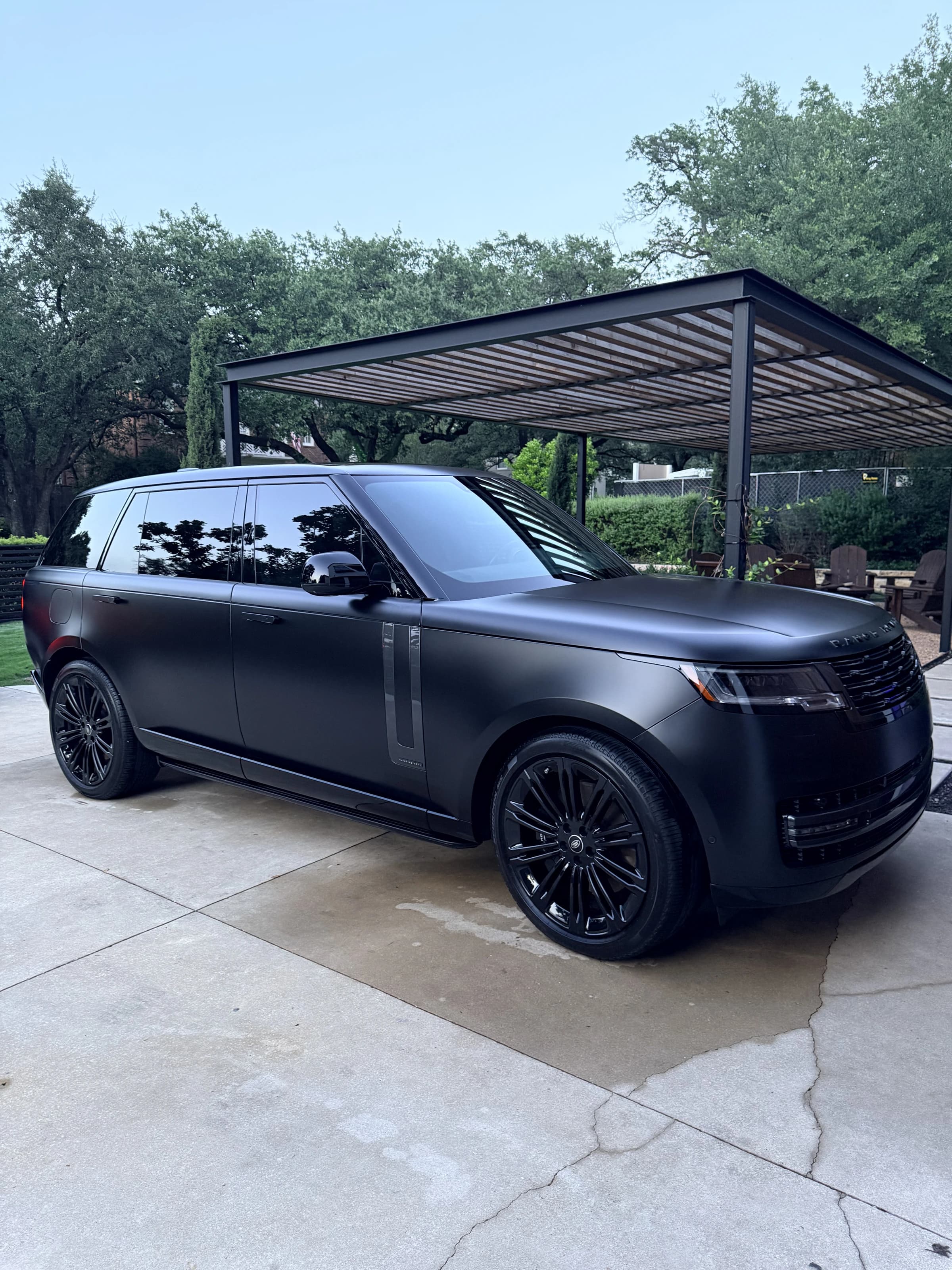 Satin black Range Rover after a full detail