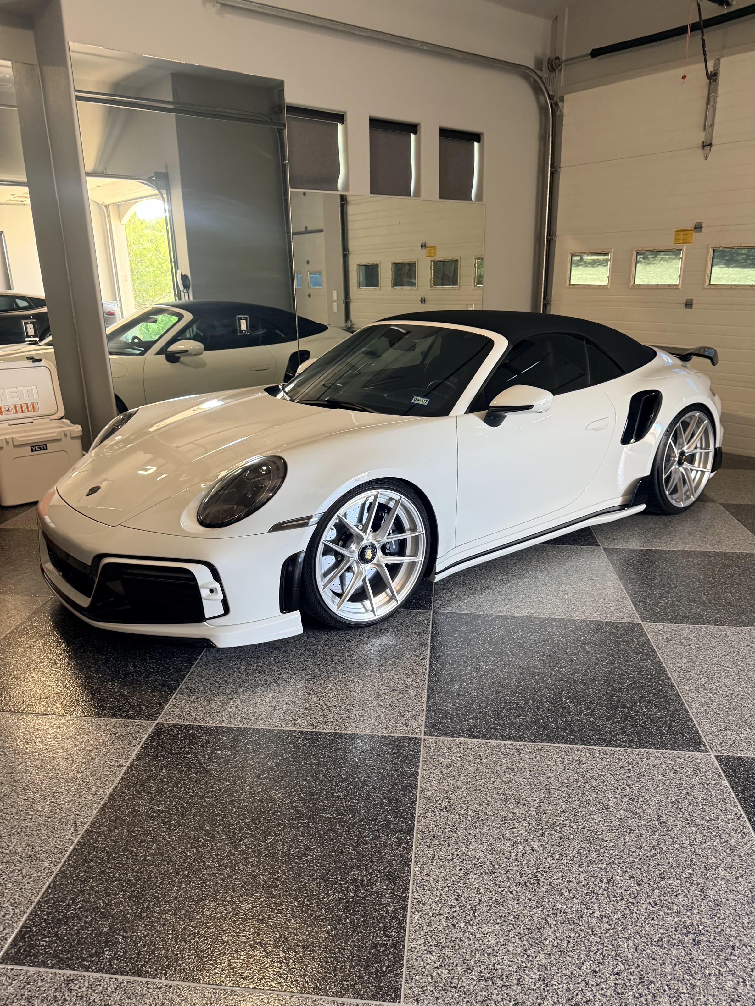 White Porsche 911 Turbo S after an exterior detail