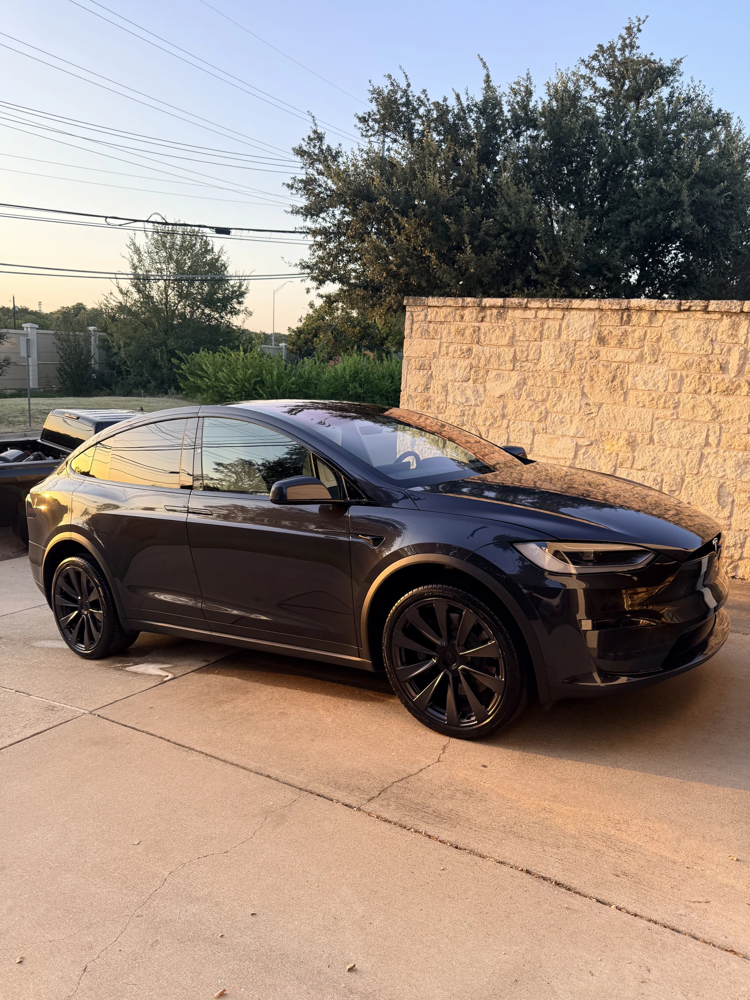 Dark SUV detailed and parked outdoors