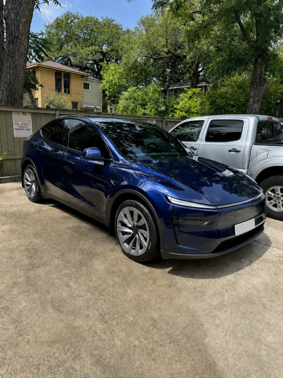 Deep blue Tesla Model Y after ceramic coating