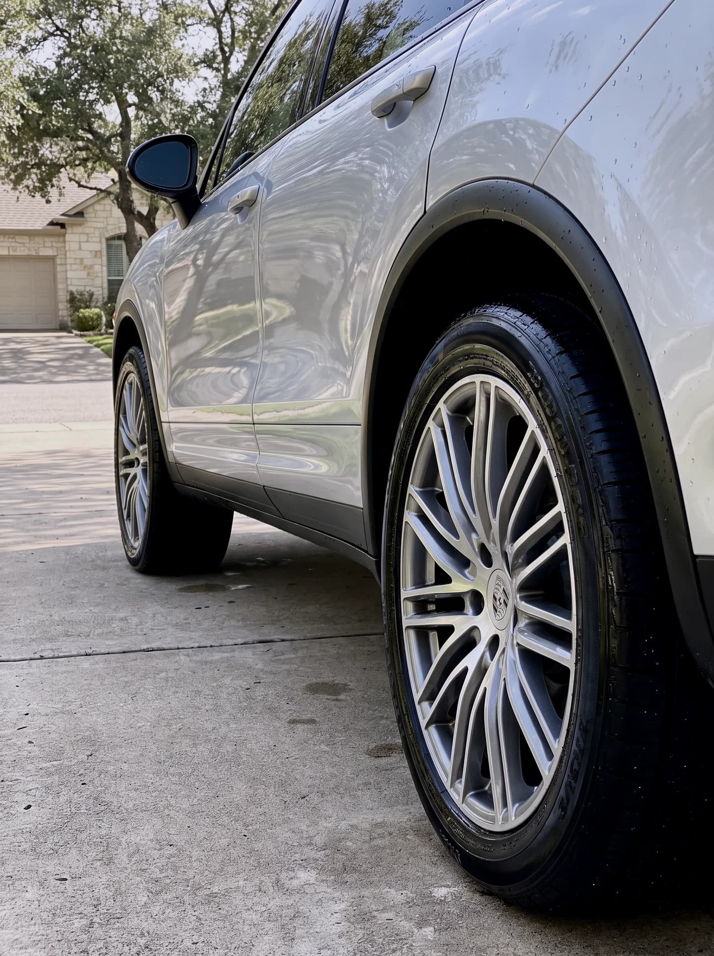 Porsche Cayenne freshly washed with clean wheels