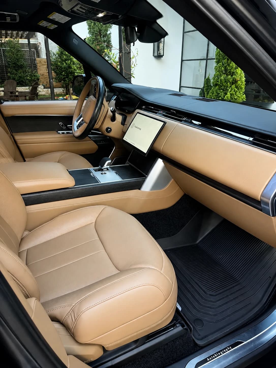 Tan luxury SUV front cabin after interior detailing