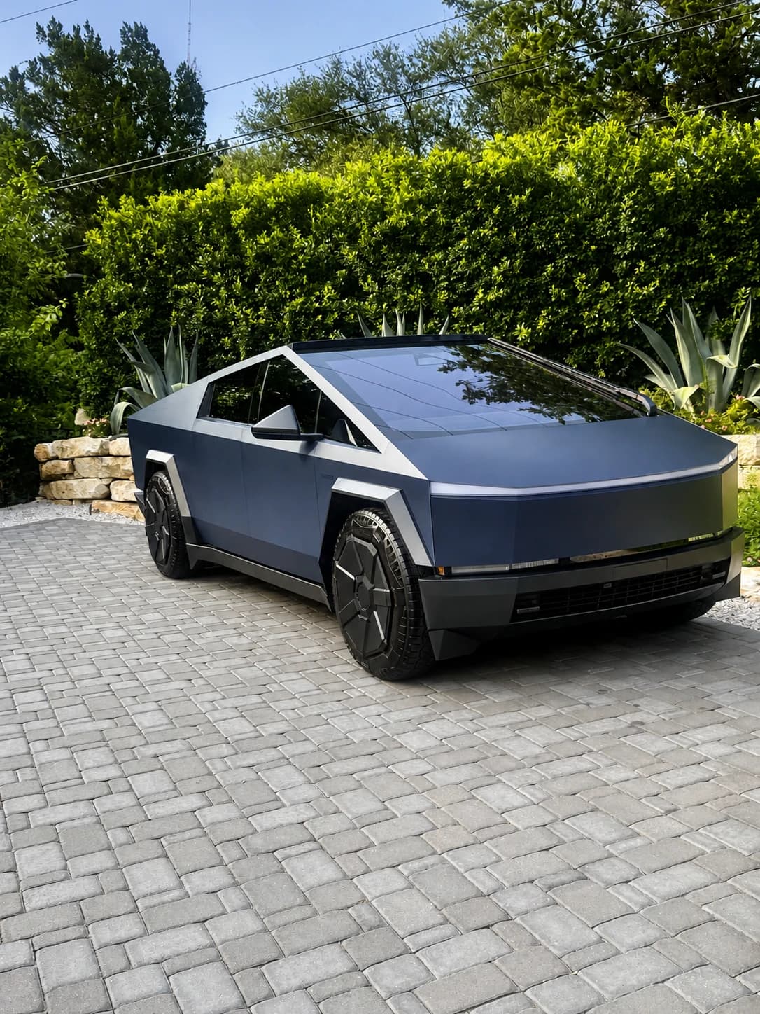 Matte dark Tesla Cybertruck after an exterior detail